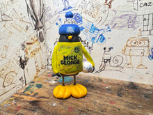 Load image into Gallery viewer, Peterborough United goalkeeper penguin 2025/2026 with football and woolly hat (yellow)
