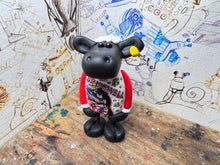 Load image into Gallery viewer, Tommy Bridewell sheep with a drawing of Tommy Bridewell at the front
