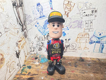 Load image into Gallery viewer, Kyle ryde cartoon character with moving head 2025 special edition
